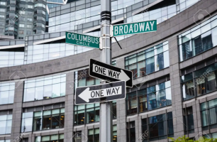 Photo of Columbus Circle and Broadway street signs