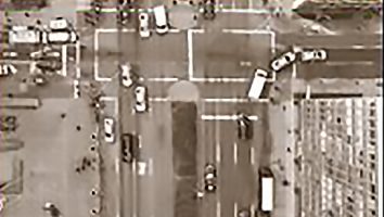 Black and white aerial photo of city intersection